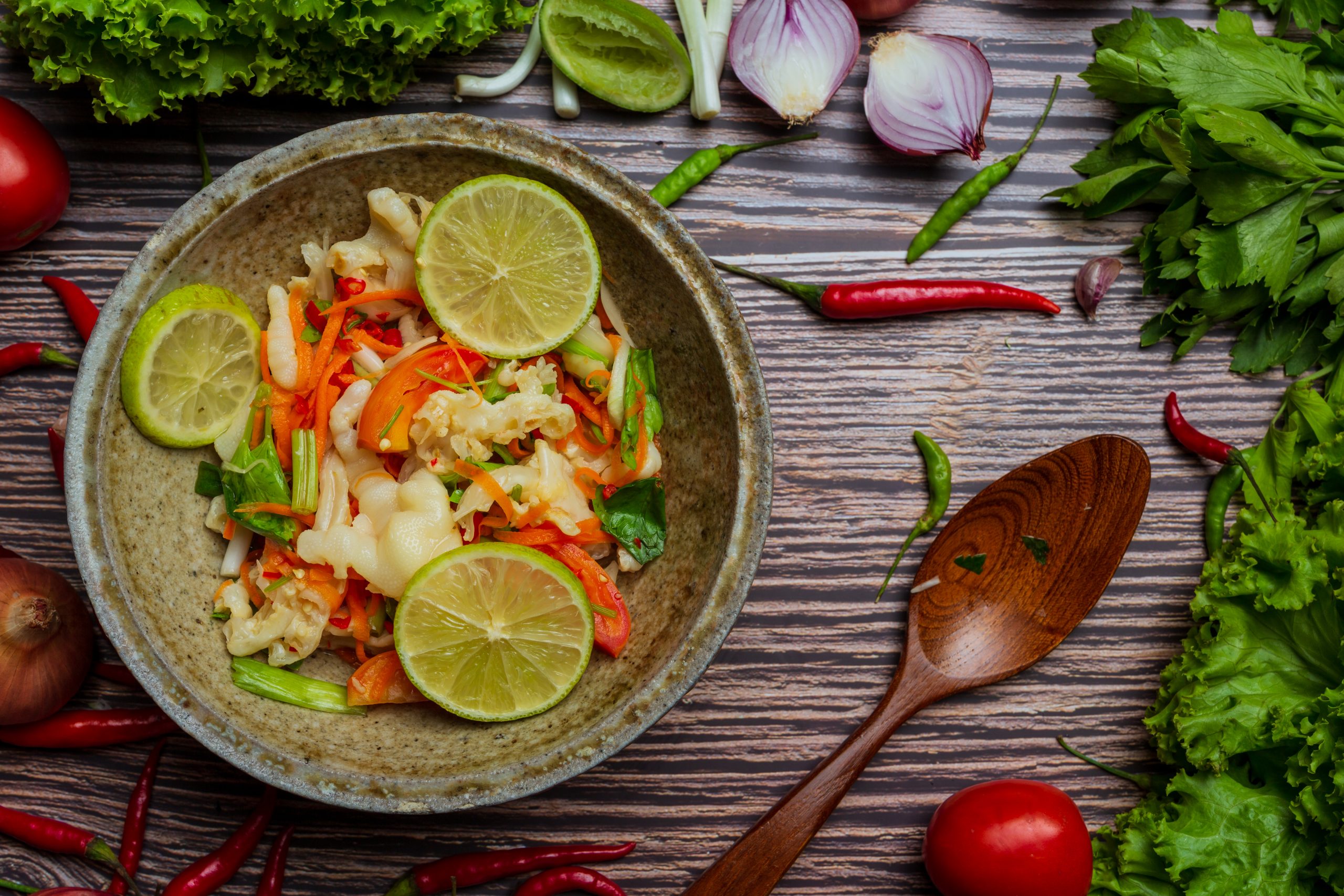 mixed vegetable and chicken feet , Thai spicy salad.